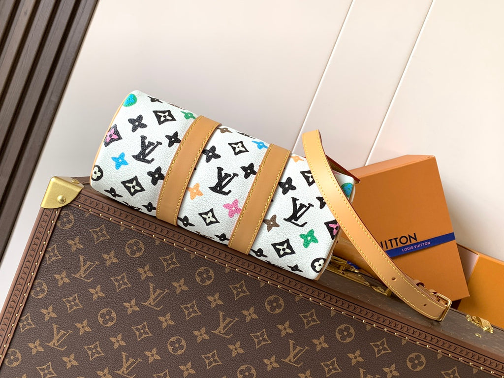 Louis Vuitton mini handbag with colorful monogram print and tan adjustable strap