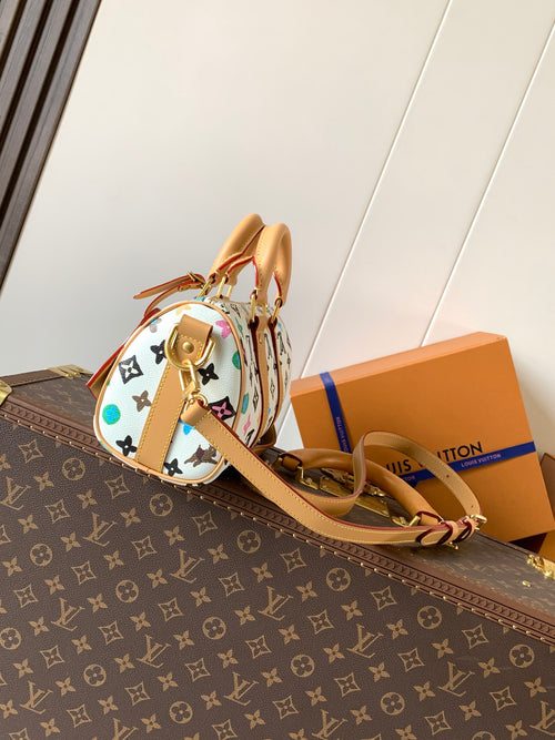 Louis Vuitton mini handbag with tan top handles and multicolor monogram side view