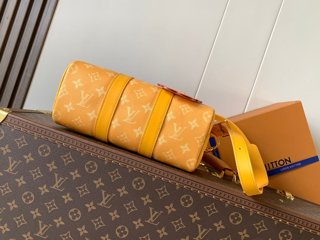 Louis Vuitton monogram canvas bag with yellow side straps and long shoulder strap