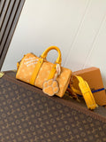 Louis Vuitton monogram tote bag with bright yellow handles and front paw detail