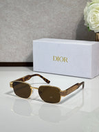 Sunglasses with tortoise frame and brown lenses, cat-eye round shape