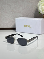 Sunglasses with black frame and dark lenses, silver detail on temples