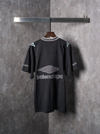 Balenciaga black short-sleeve T-shirt with large back logo and striped collar