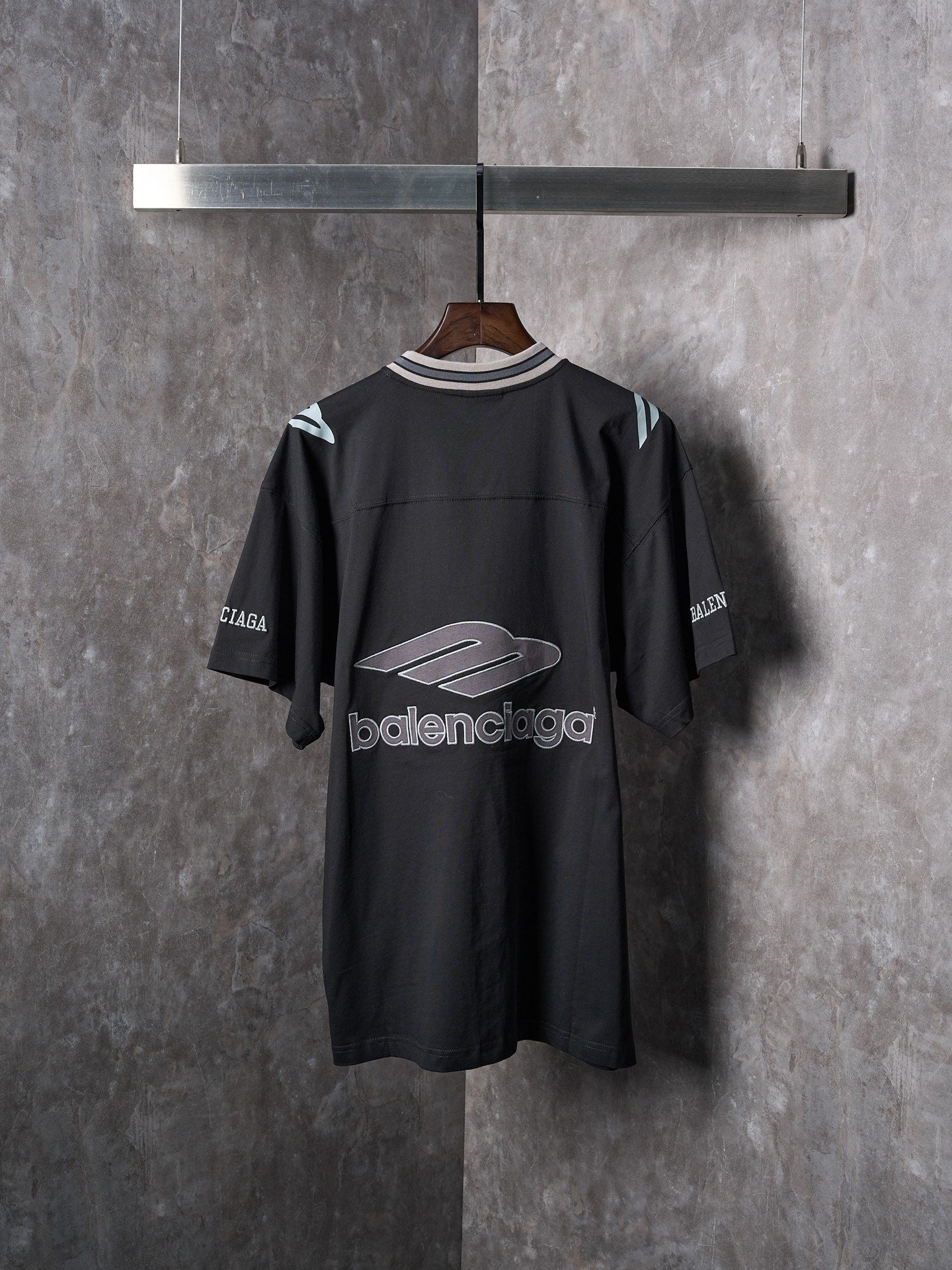 Balenciaga black short-sleeve T-shirt with large back logo and striped collar