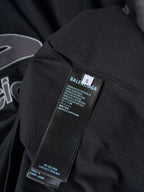 Balenciaga black T-shirt with size label and fabric care tag