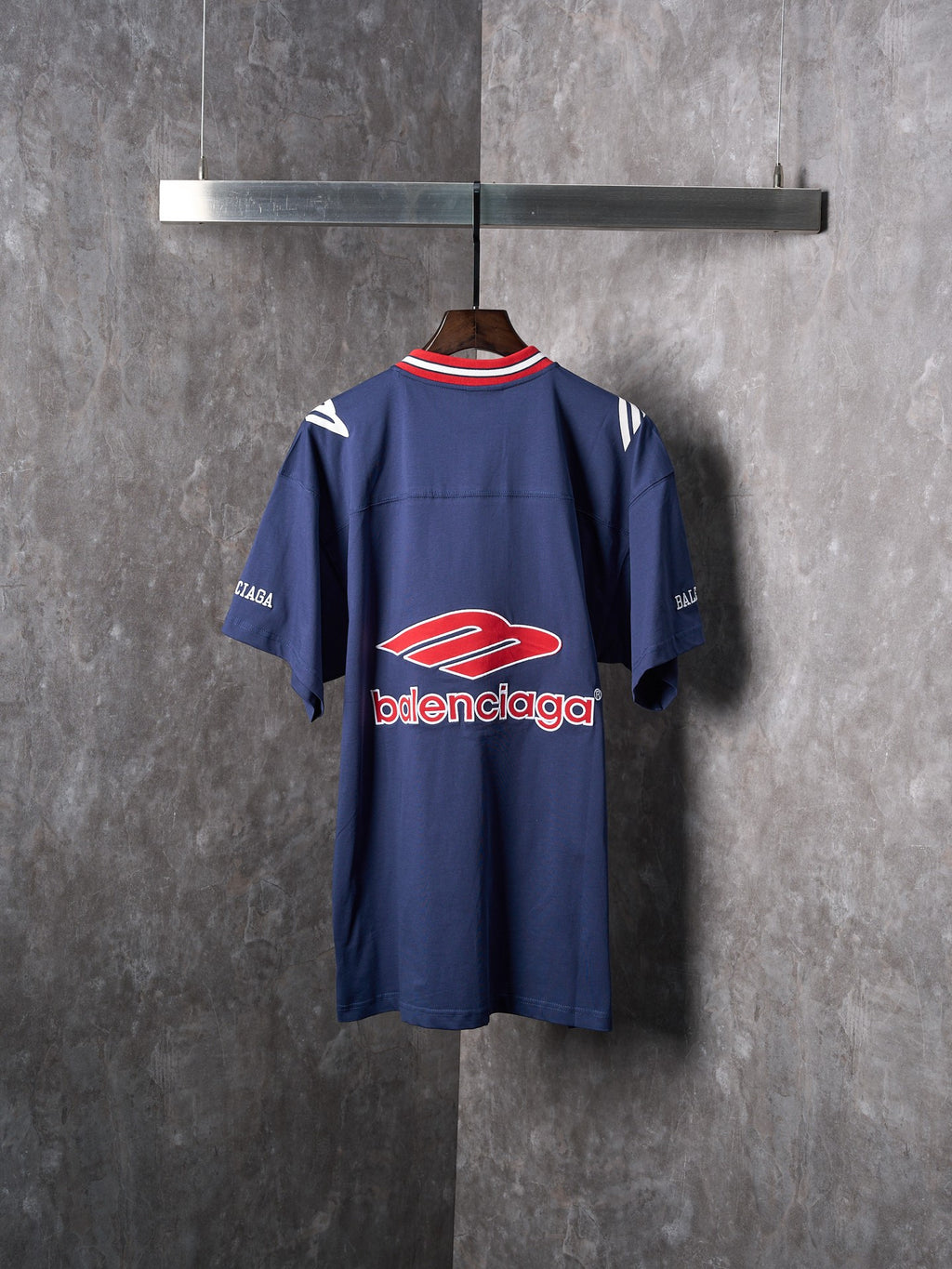 Balenciaga navy short-sleeve jersey, back view with large logo print
