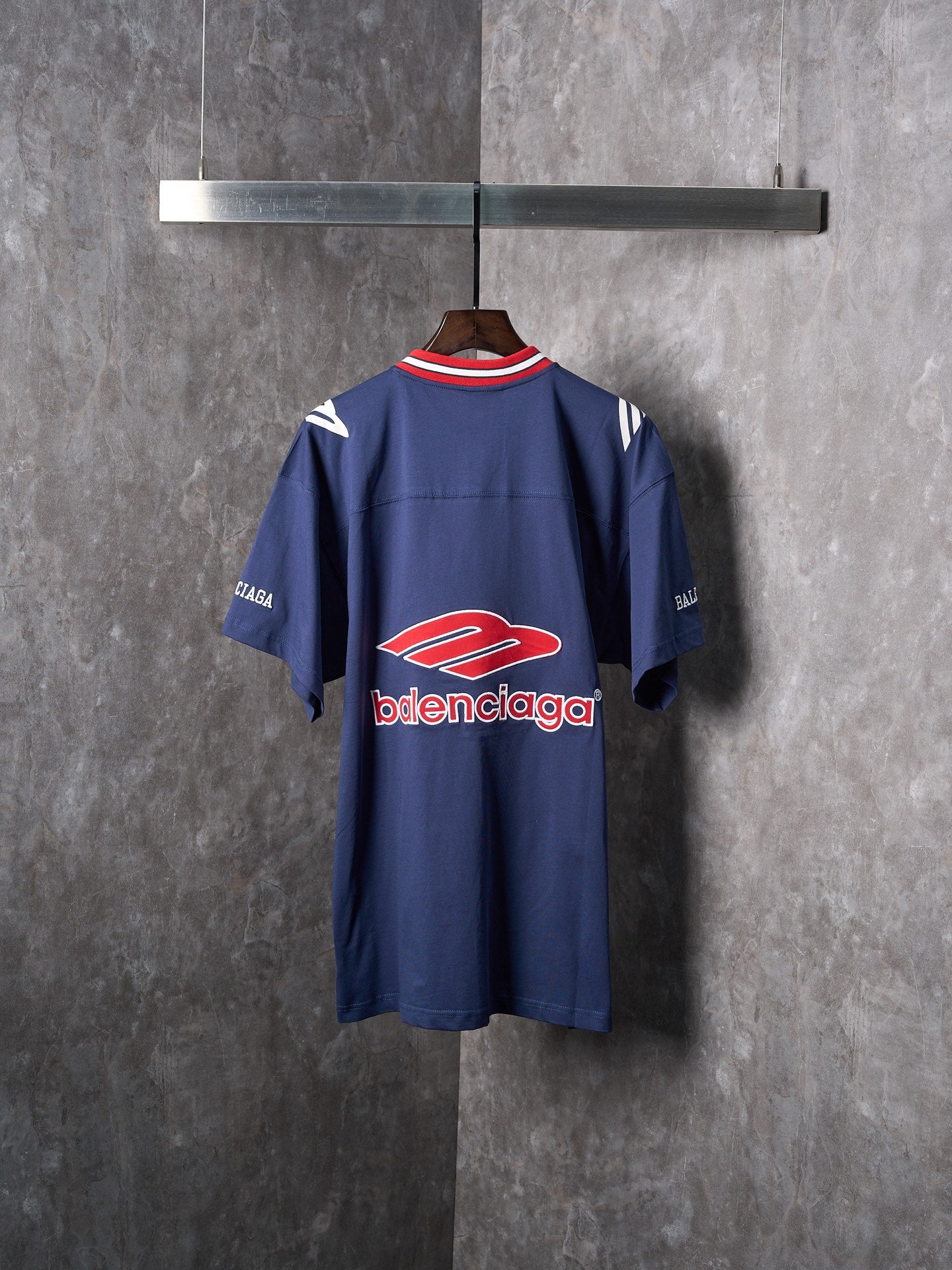 Balenciaga navy short-sleeve jersey, back view with large logo print