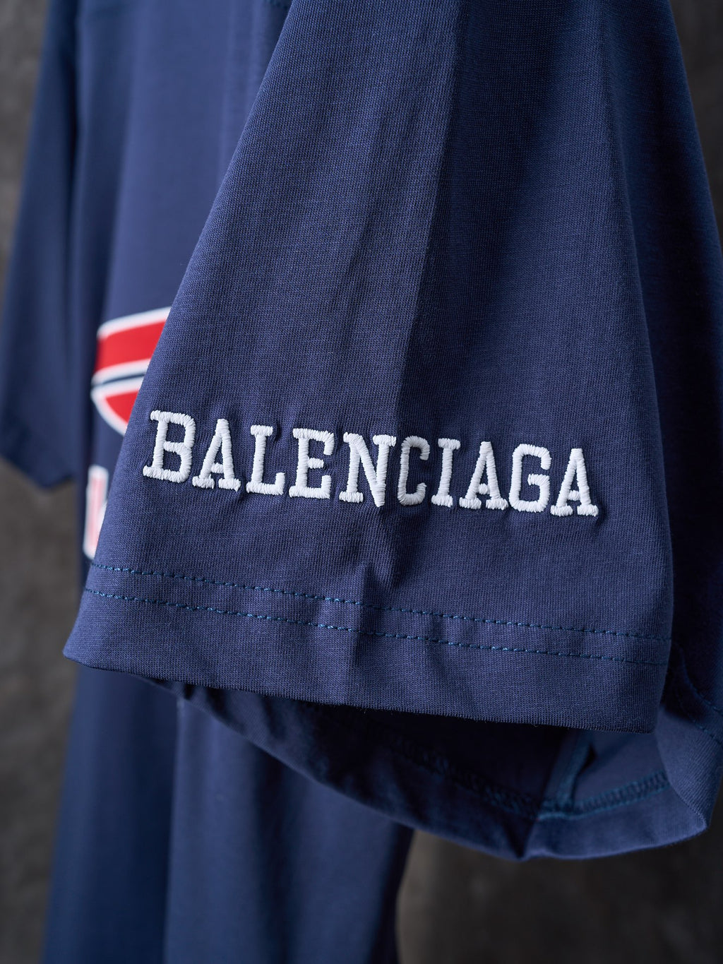 Balenciaga navy jersey hem with BALENCIAGA logo text