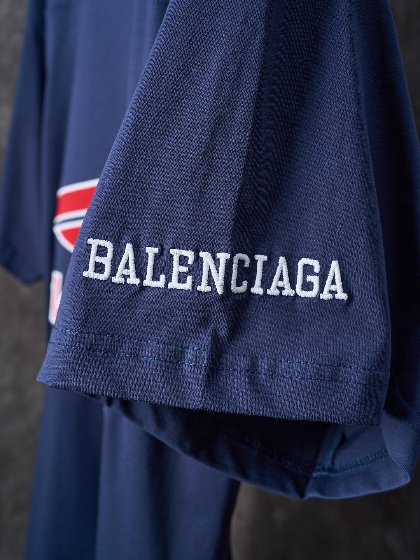 Balenciaga navy jersey hem with BALENCIAGA logo text