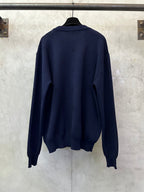 Louis Vuitton long-sleeve sweater back view, dark navy knit with small logo pattern