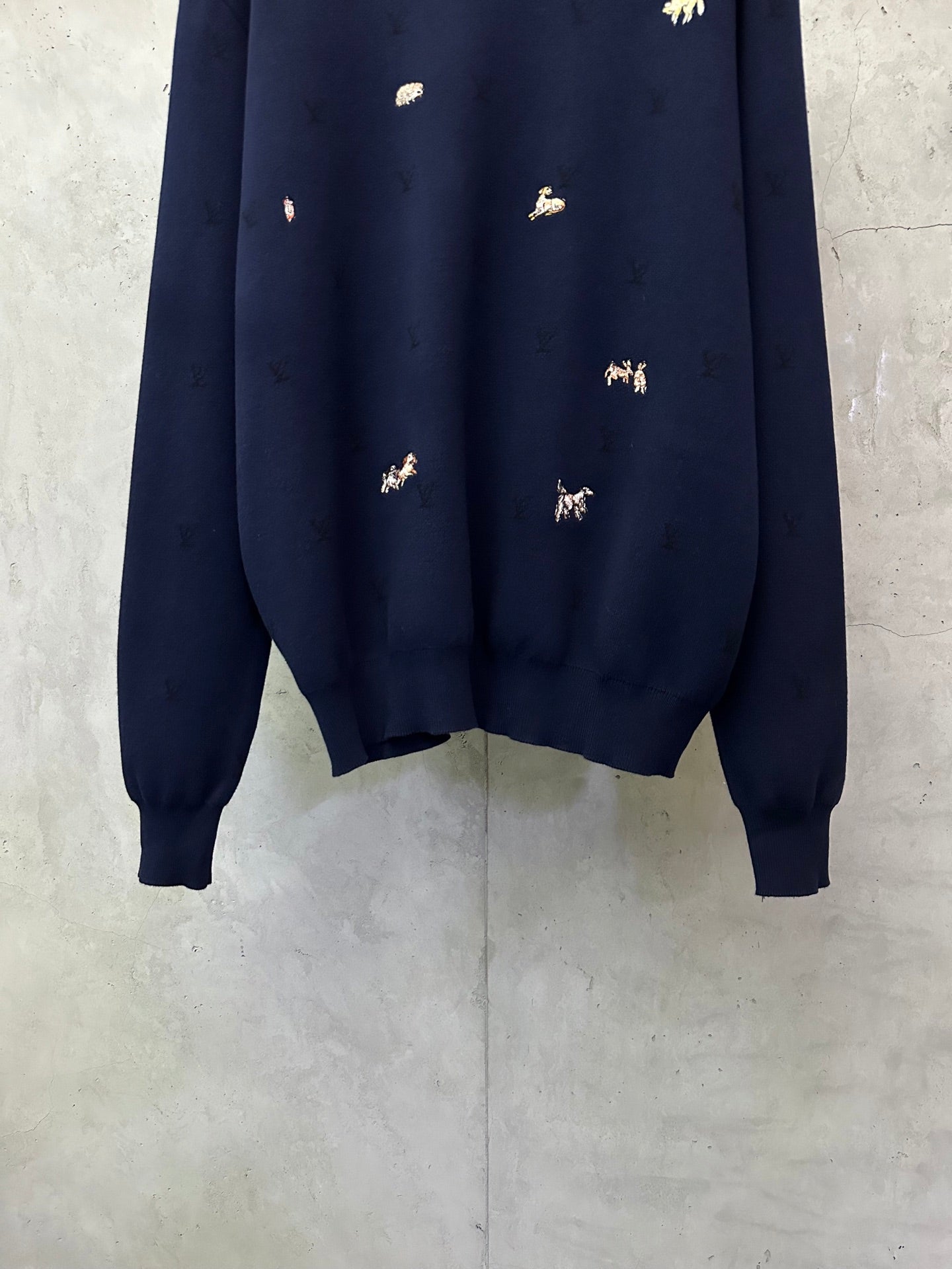 Louis Vuitton sweater front hem, dark navy knit with small animal embroidery