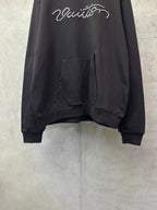 Black long-sleeve hoodie with rhinestone script logo and front kangaroo pocket