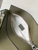 Loewe leather bag open pocket with white patterned lining and top zipper