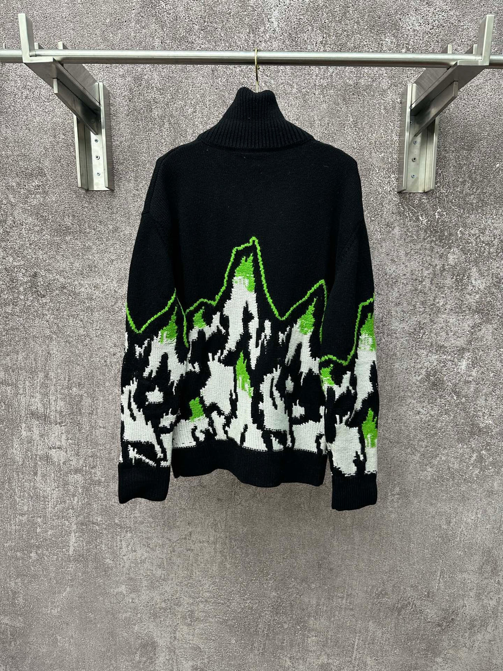Gucci black knit sweater with white and neon green mountain graphic, ribbed high neck