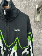 Gucci black knit zip sweater with ribbed collar and small Gucci logo on chest