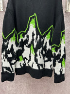 Long knit sweater with black base, neon green and white abstract pattern