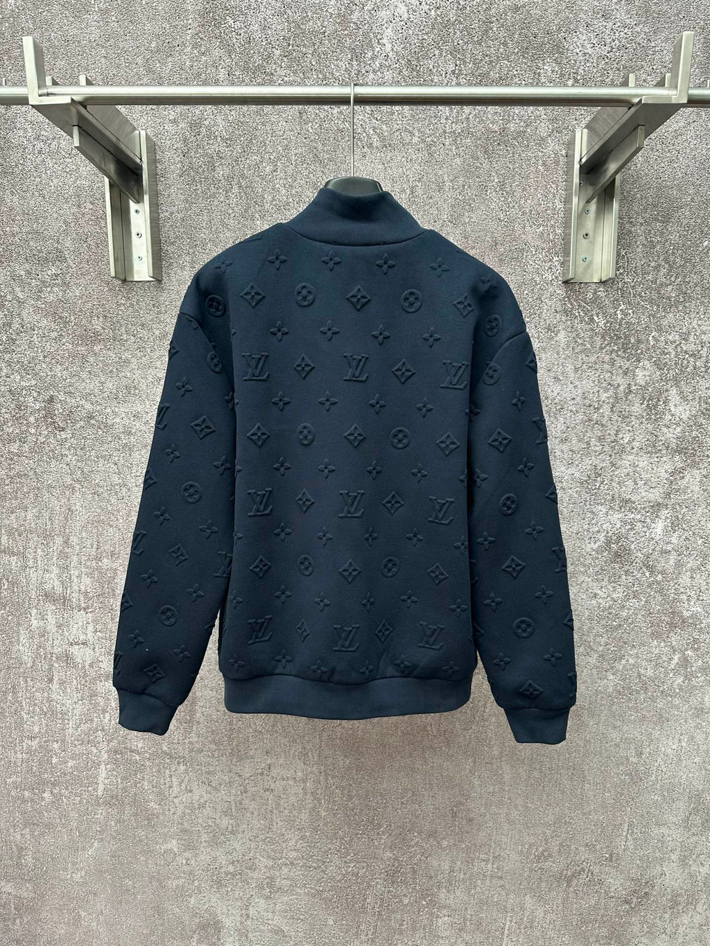 Louis Vuitton long-sleeve zip jacket with dark blue monogram pattern, back view
