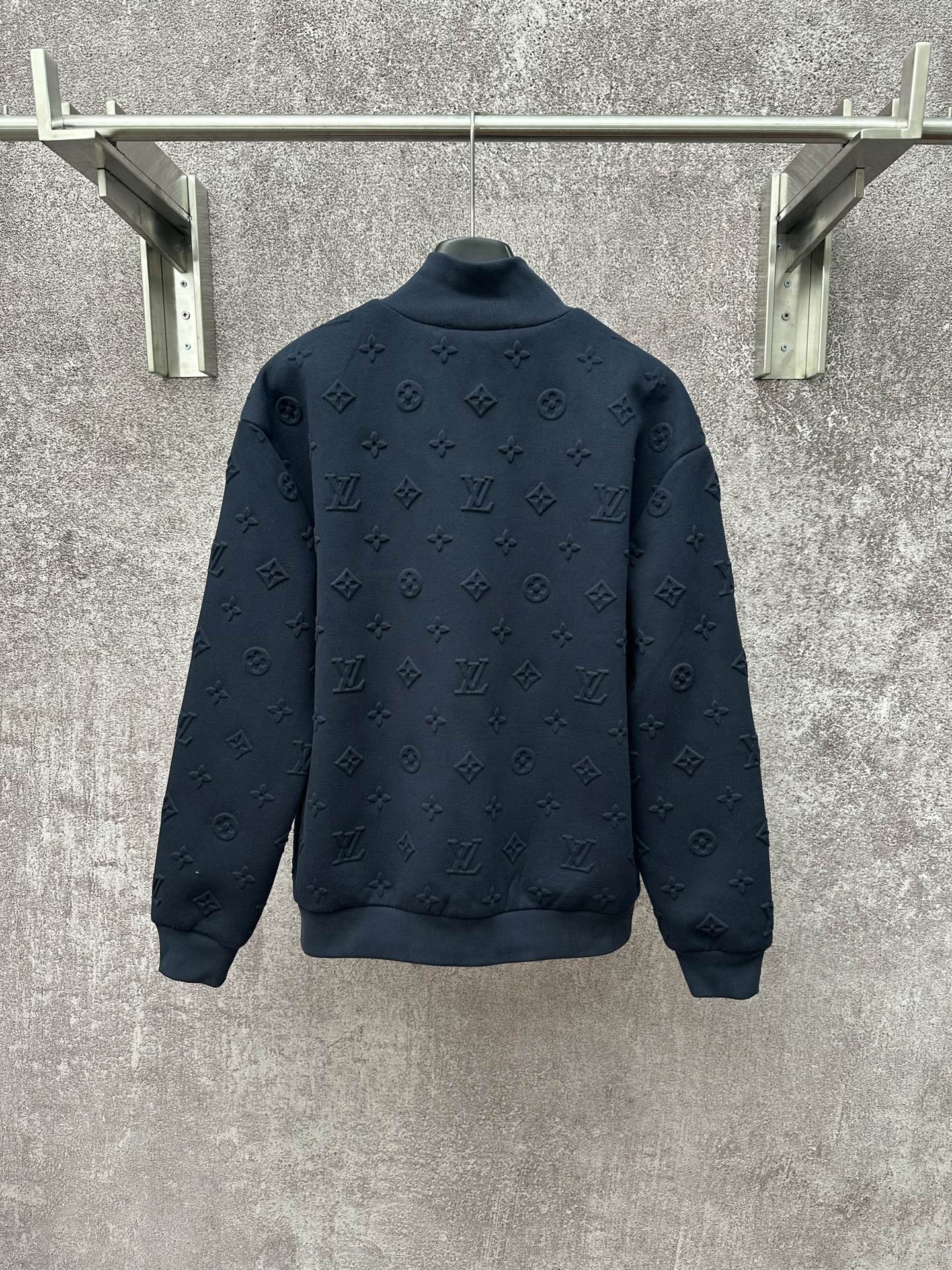 Louis Vuitton long-sleeve zip jacket with dark blue monogram pattern, back view