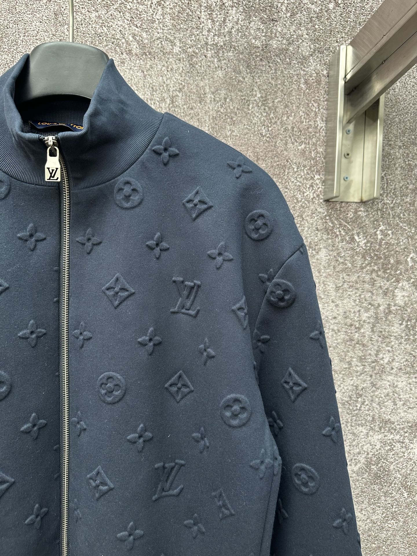 Louis Vuitton long-sleeve zip jacket in dark blue with embossed monogram motifs
