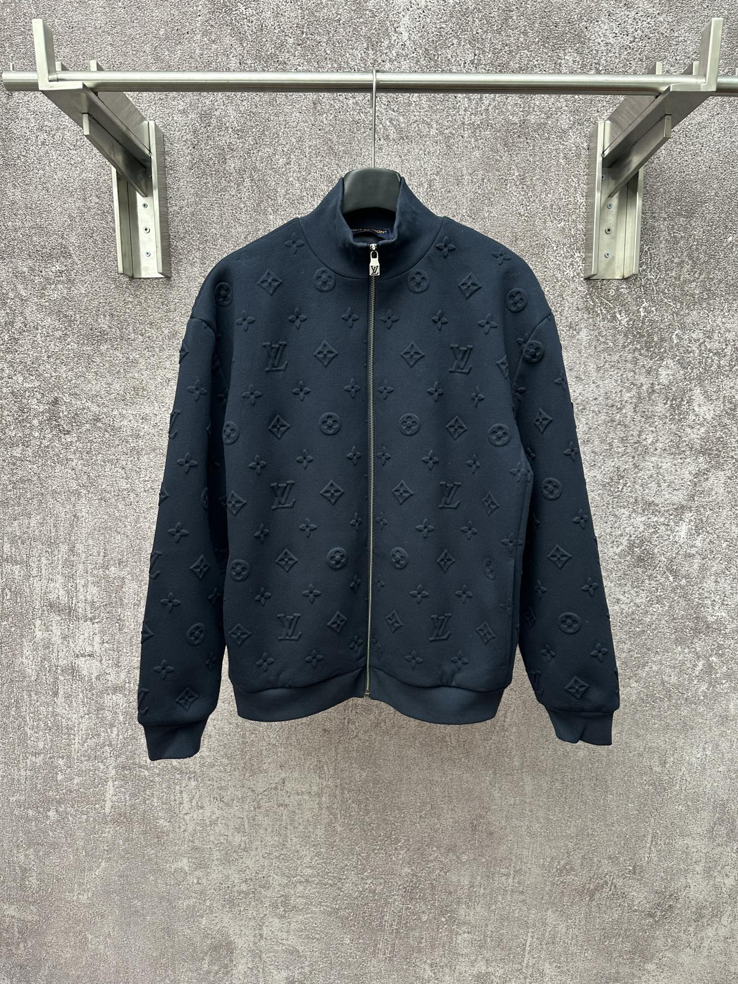 Louis Vuitton long-sleeve zip jacket in dark blue with subtle monogram texture