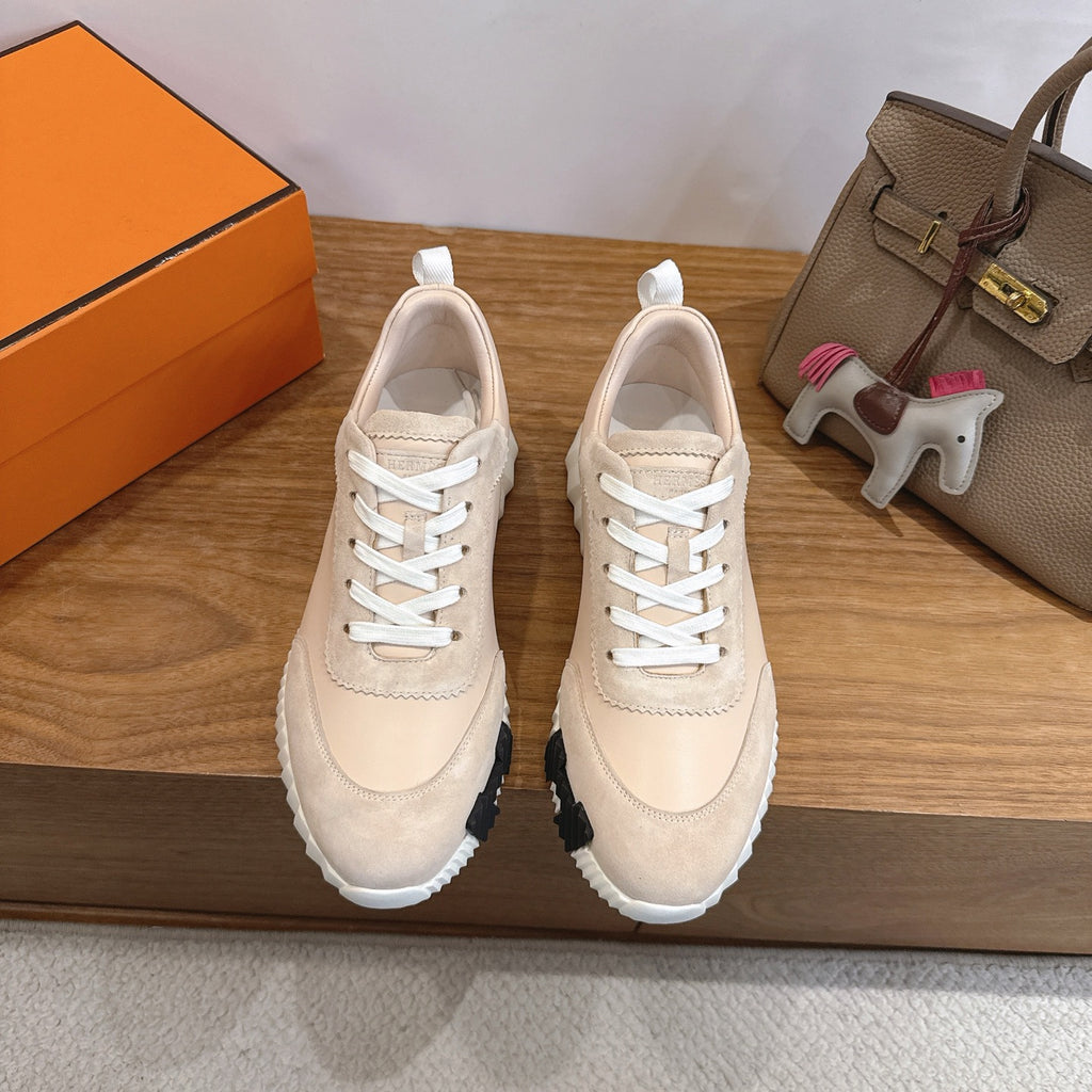 Unisex beige sneakers with white laces and chunky striped sole