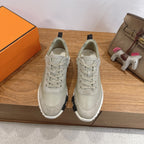 Hermes unisex sneakers, light gray suede upper with lace-up front and white sole