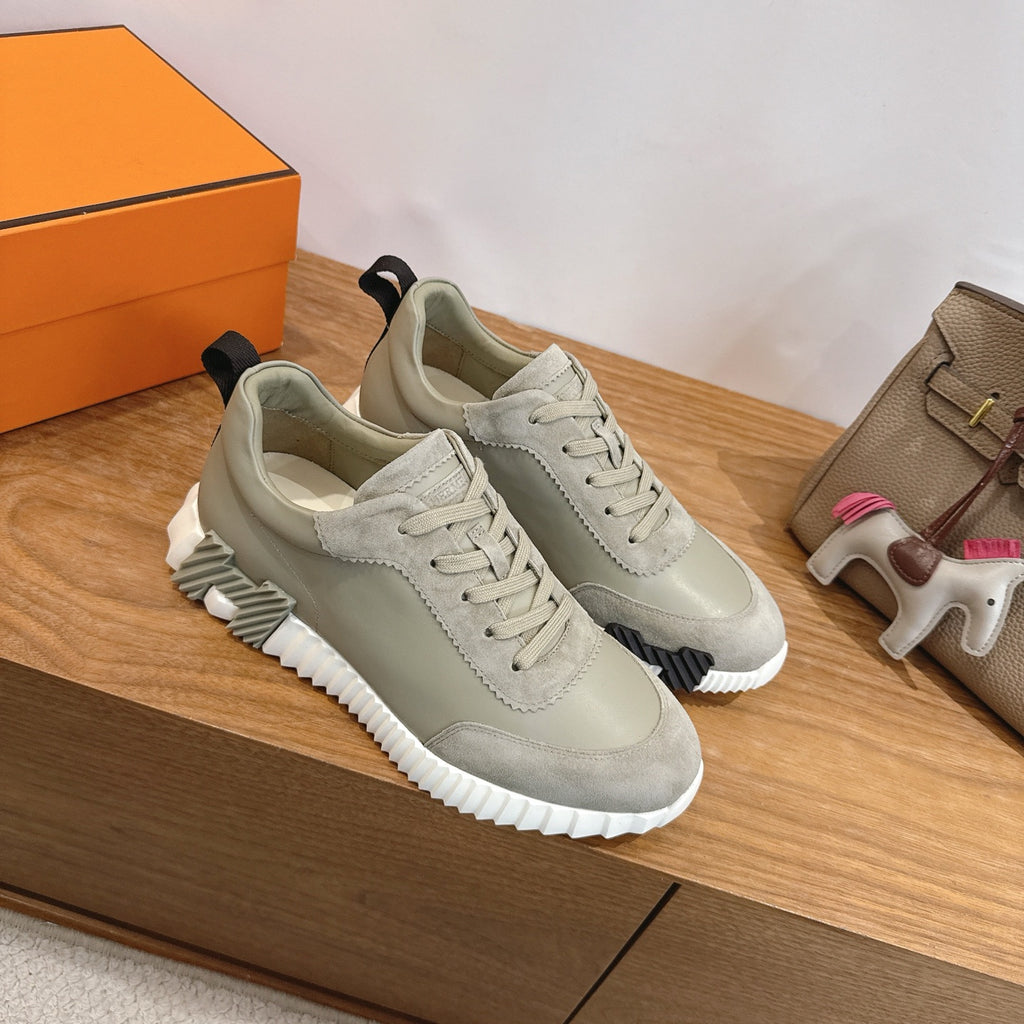 Hermes unisex sneakers pair, light gray suede with lace-up and ridged white rubber sole