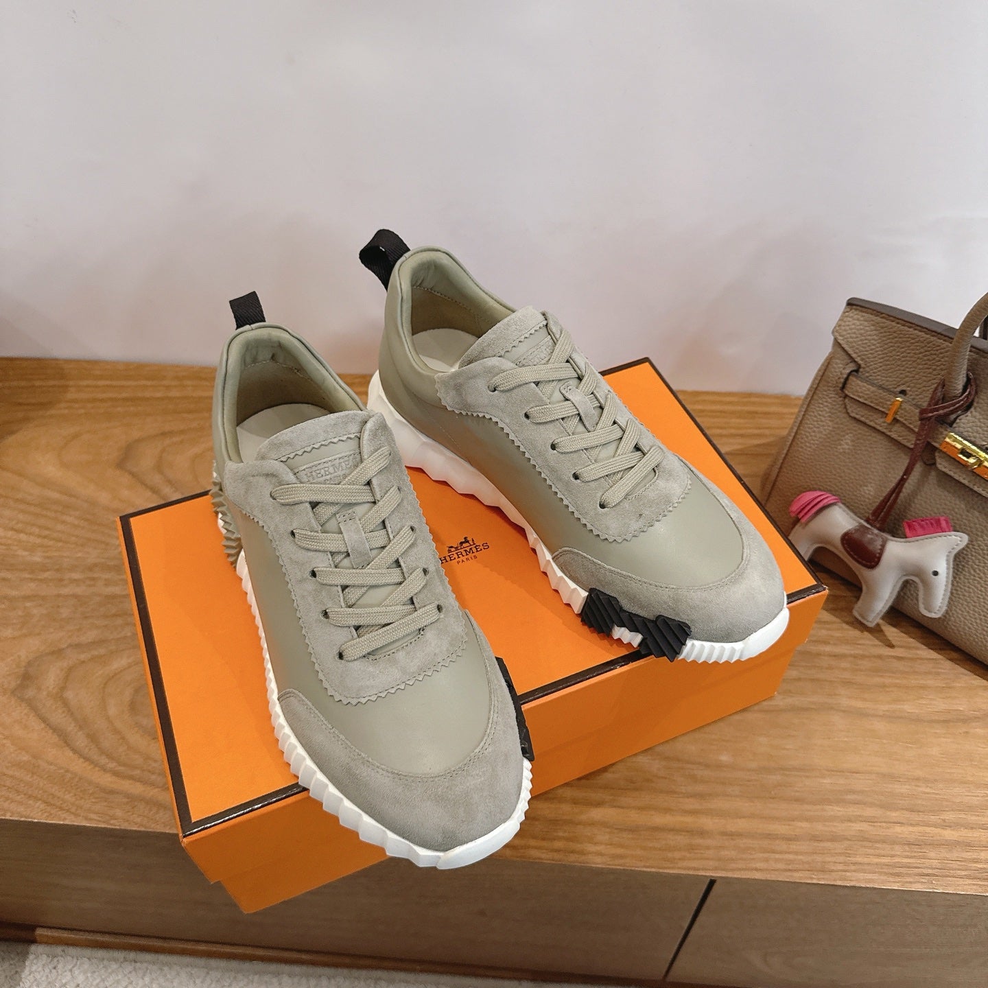 Hermes unisex sneakers, light gray suede, lace-up closure and chunky white sole