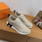 Unisex lace-up sneakers in light beige with textured tread sole, side view