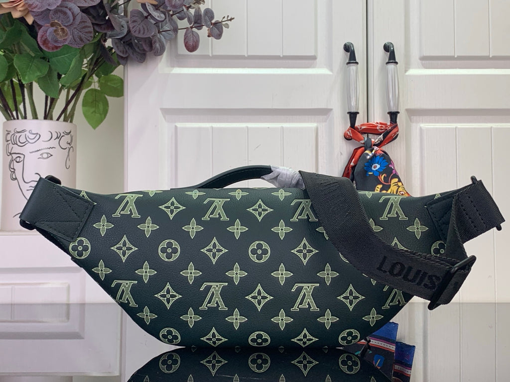 Louis Vuitton monogram bag in dark green with front zipper and strap loops