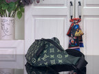 Green monogram belt bag with front zipper and loop handle