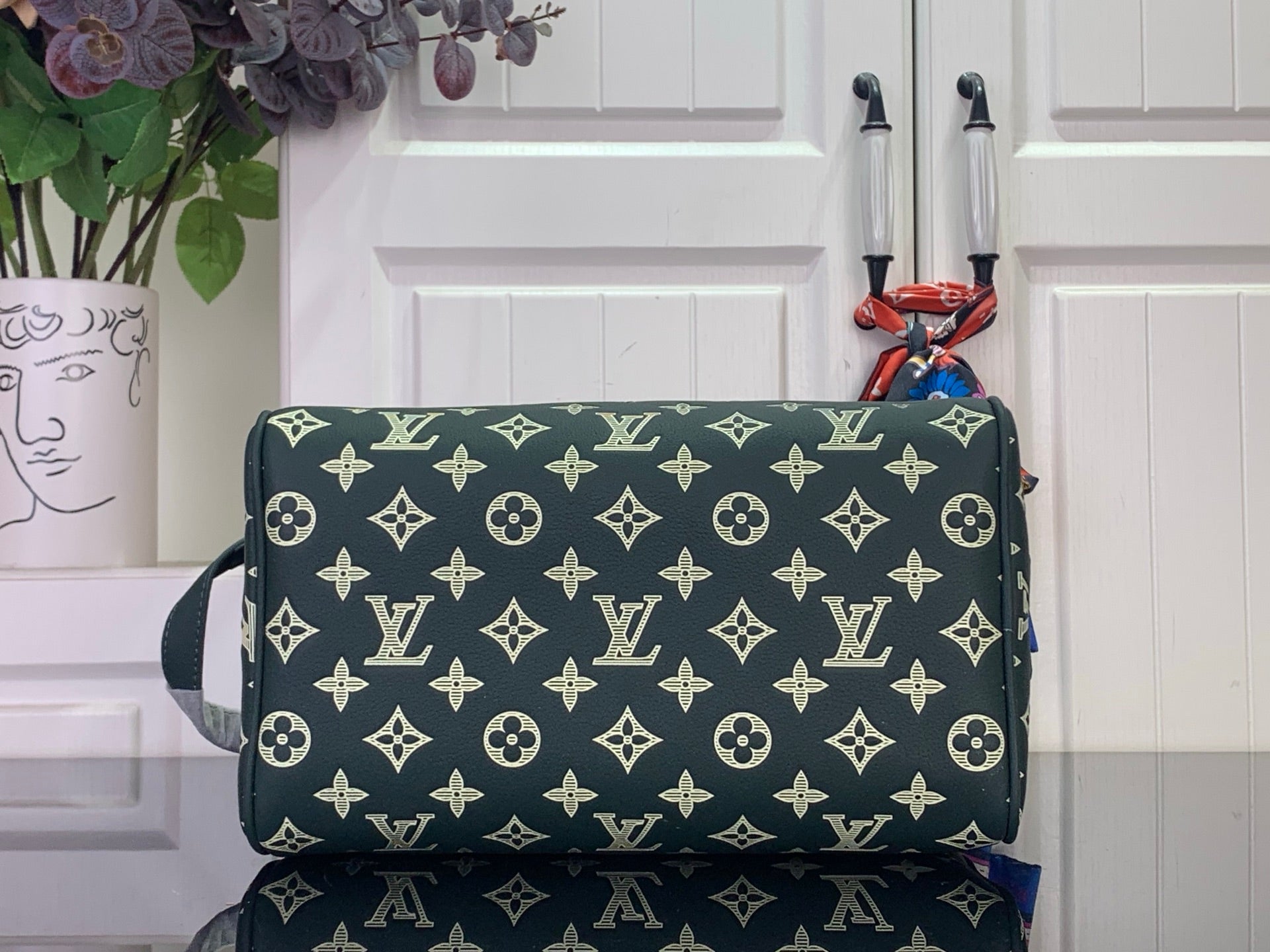 Louis Vuitton monogram crossbody bag, dark green with allover gold motif