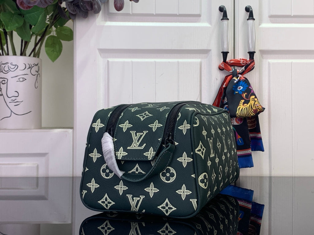 Louis Vuitton monogram shoulder bag, dark green with gold pattern and flap front