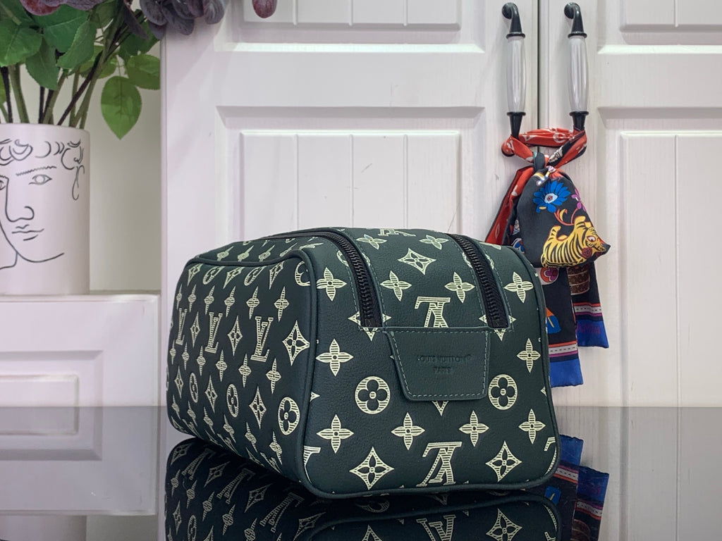 Louis Vuitton monogram shoulder bag, dark green with gold pattern, front flap pocket