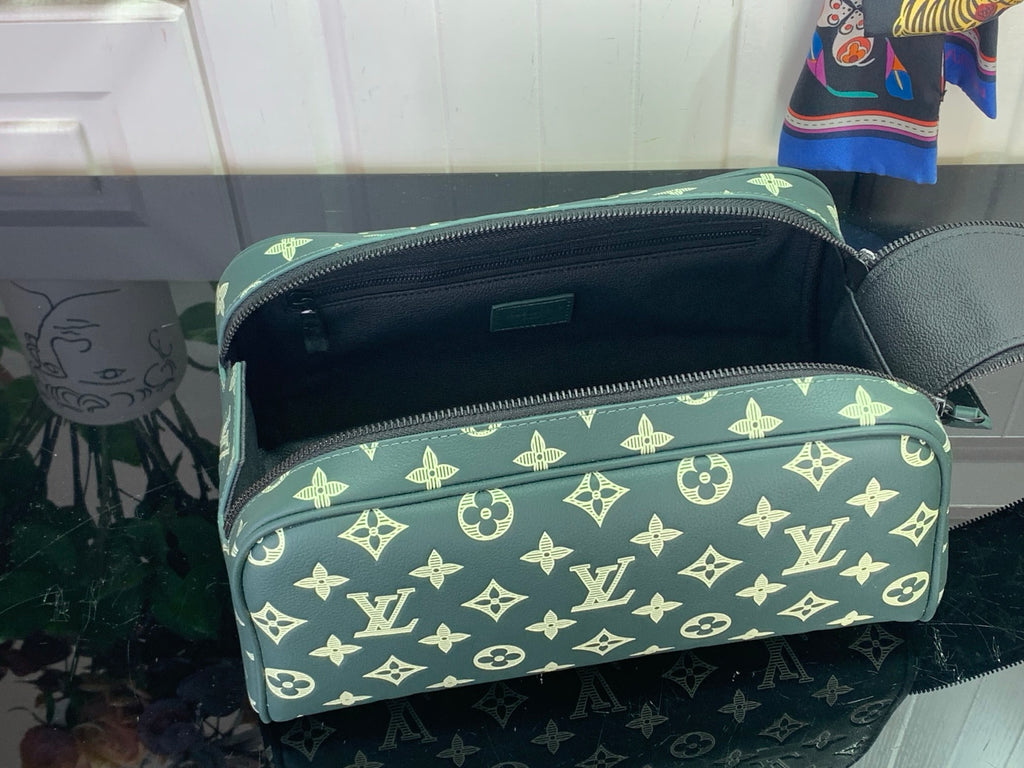 Louis Vuitton monogram pouch, dark green with gold pattern, open zipper top and lining