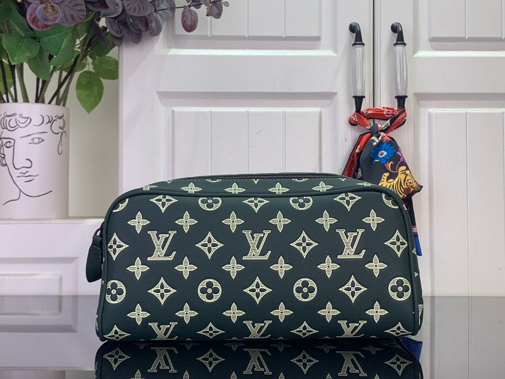 Louis Vuitton monogram toiletry bag in dark green with gold pattern, top zip