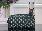 Louis Vuitton monogram toiletry bag in dark green with gold pattern, top zip