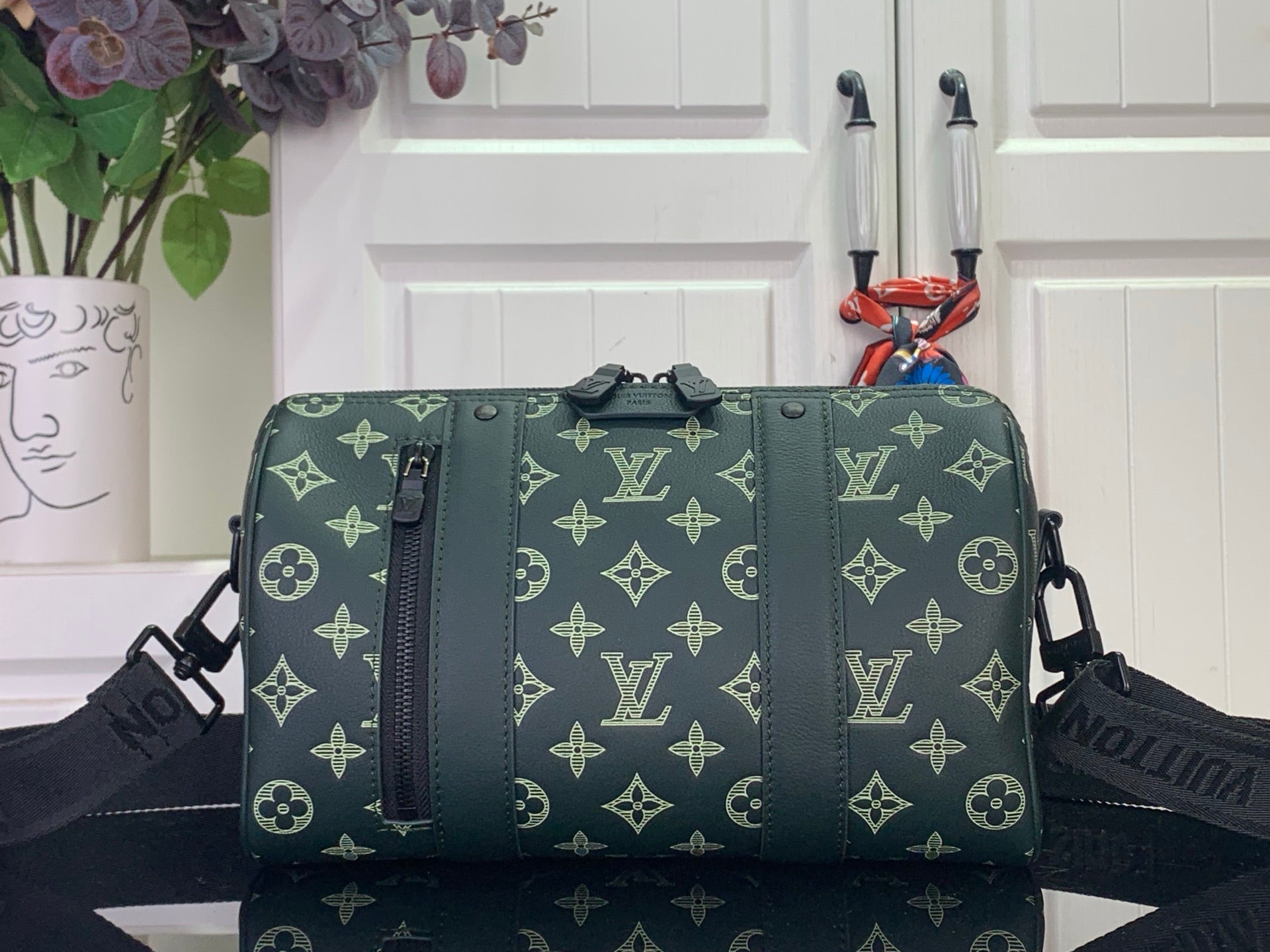 Louis Vuitton men's duffel bag with green monogram canvas and top handles