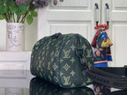 Louis Vuitton men's duffel bag with green monogram pattern and shoulder strap