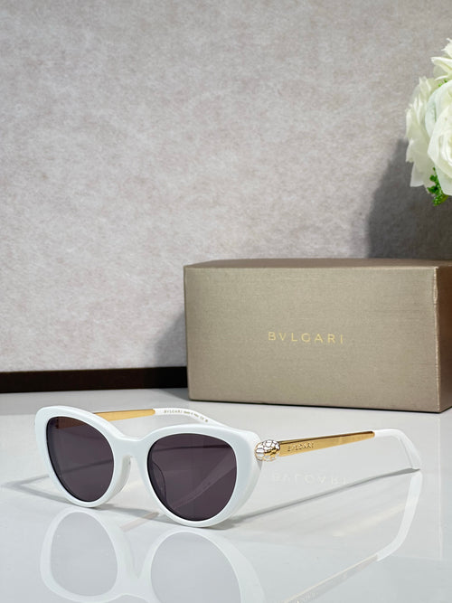 Bvlgari sunglasses with white rounded frames and dark lenses, gold-tone temples