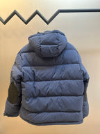 Off White dark blue puffer jacket back view with hood and padded seams