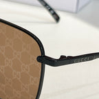 Black eyeglass temple with small brand lettering near hinge