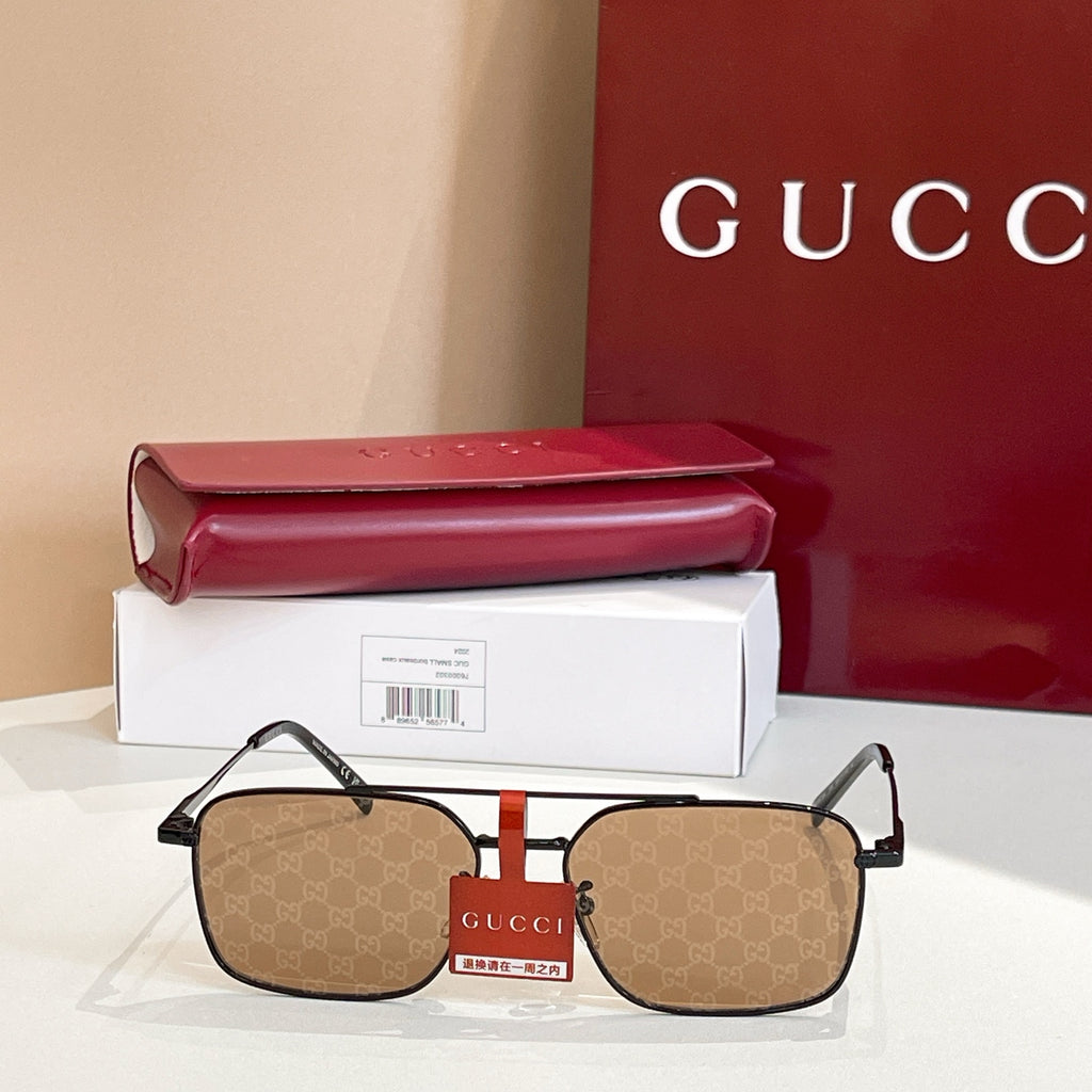 Black eyeglasses with brown GG-pattern lenses and rectangular frames