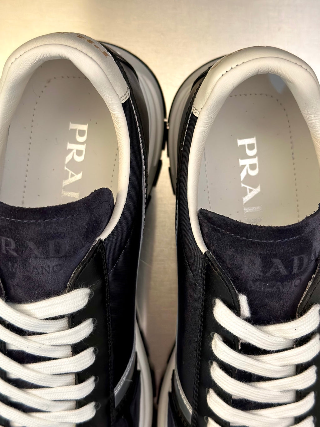 Prada unisex sneakers, PRADA logo on insoles, dark navy with white laces