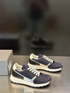 Prada unisex sneakers, navy and cream panels with white lace-up detailing
