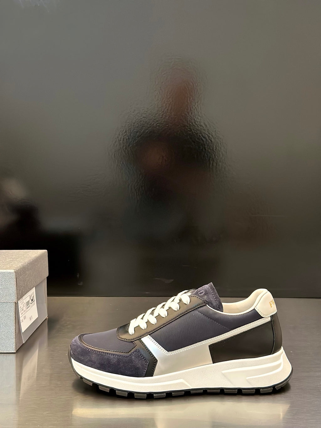 Prada unisex sneakers, dark navy with cream midsole and white lace-up