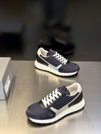 Prada unisex sneakers, navy upper with cream stripes and white lace-up