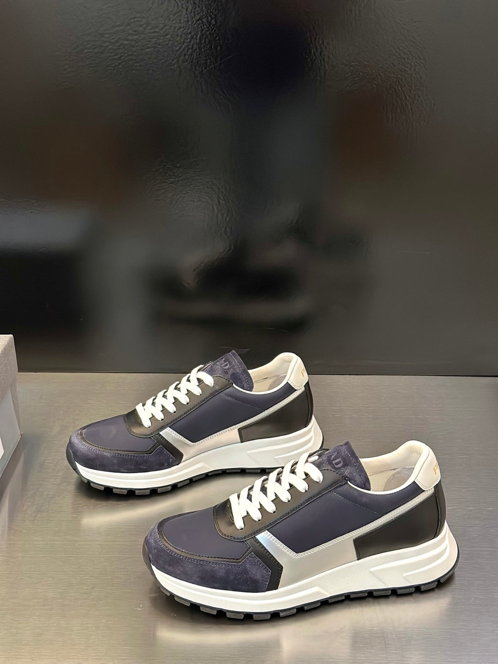 Prada unisex sneakers, navy suede-look with cream panel and white laces