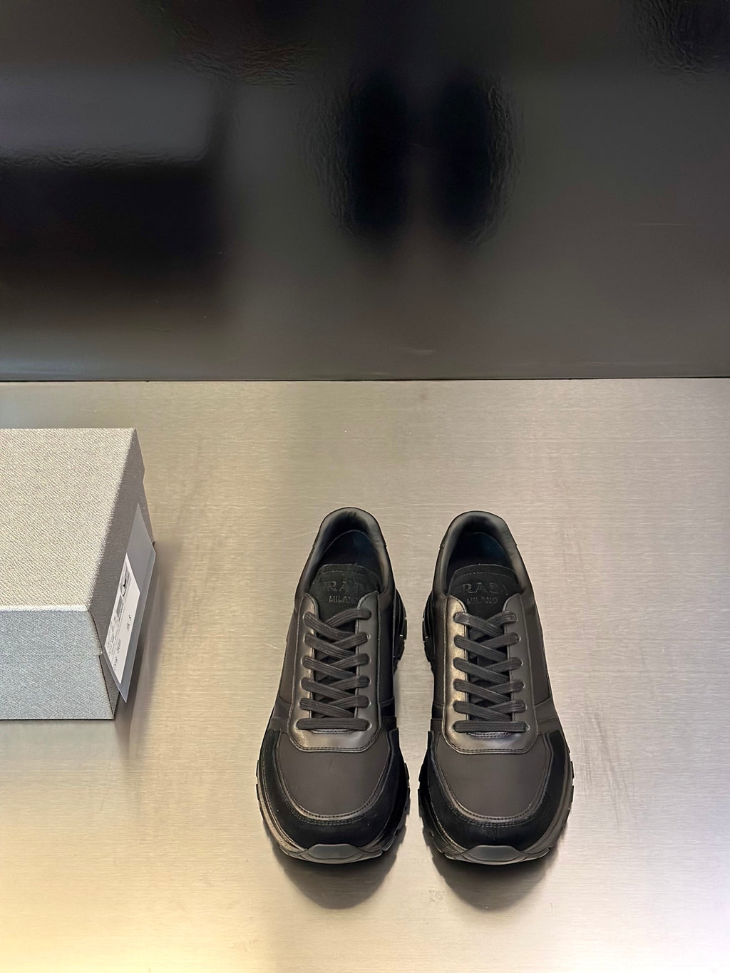 Prada unisex lace-up sneakers, dark gray with gray paneling and chunky rubber sole