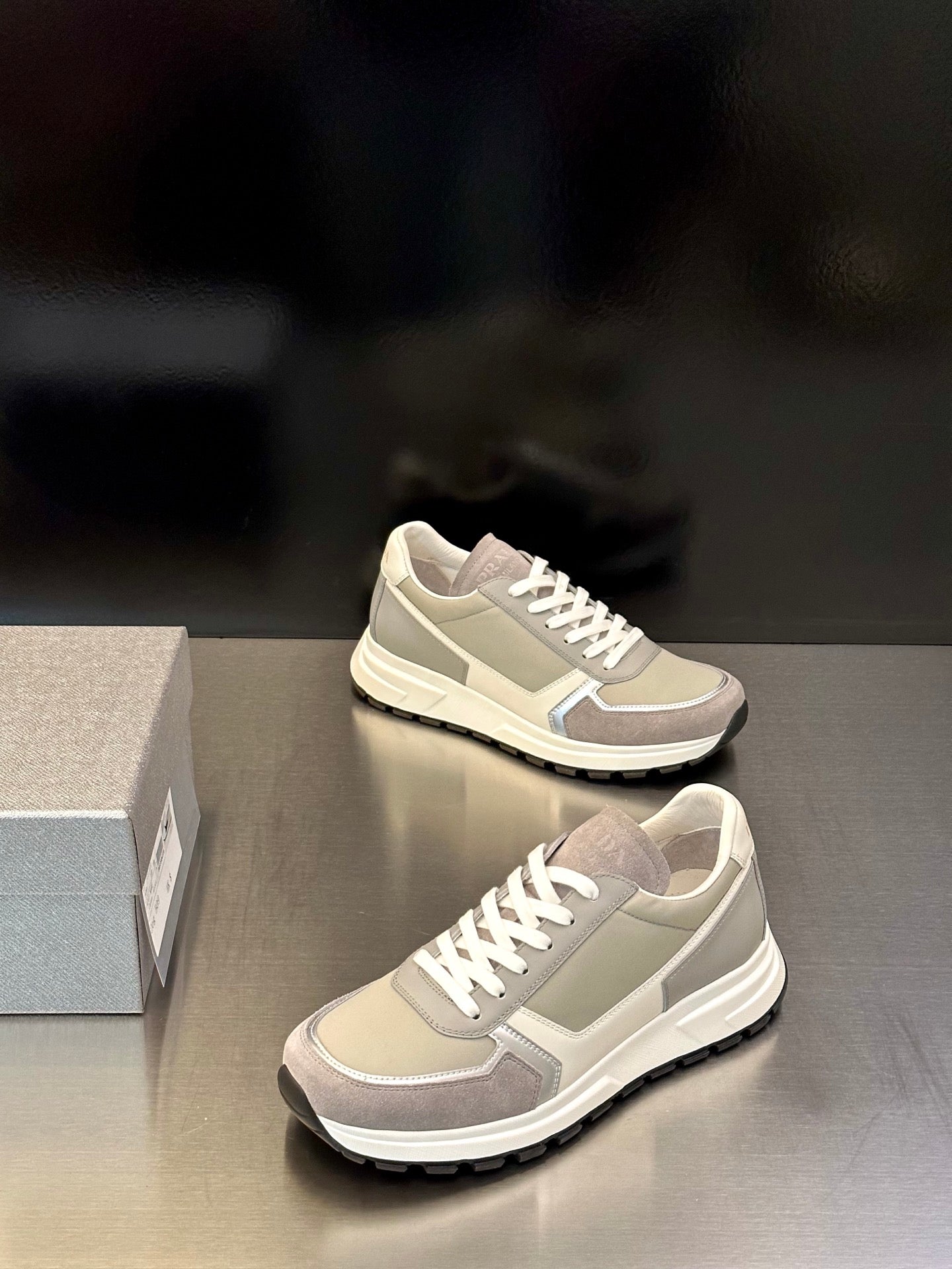 Prada unisex sneakers in light beige with white laces and chunky rubber sole